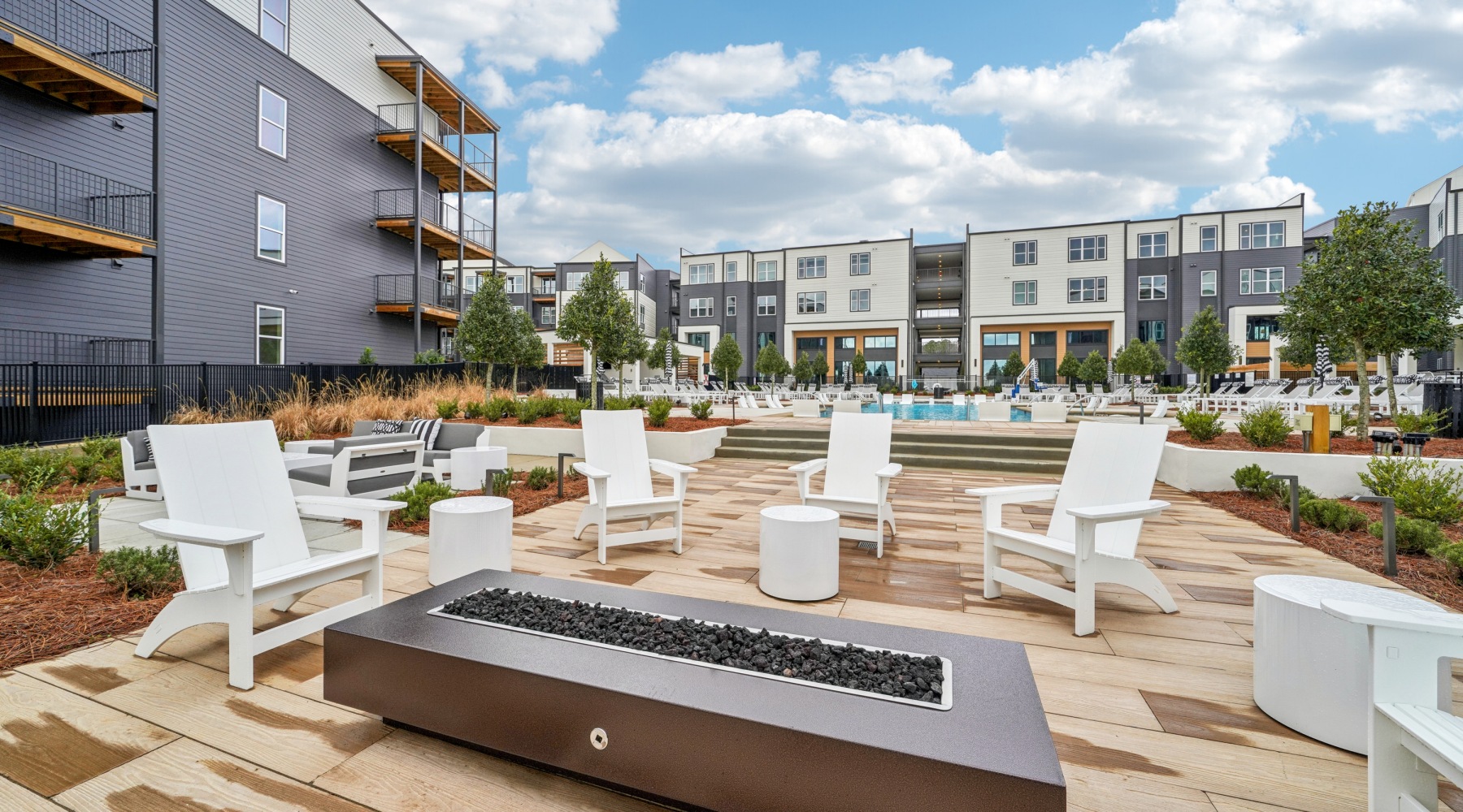 Fire pit lounge area by the pool at Colina Hillside in Hoover, AL