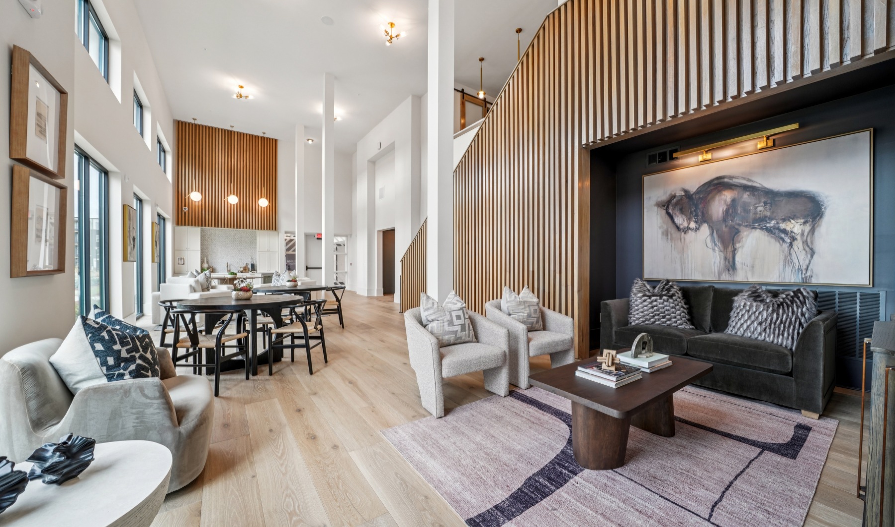 Resident social lounge with seating at Colina Hillside in Hoover, AL