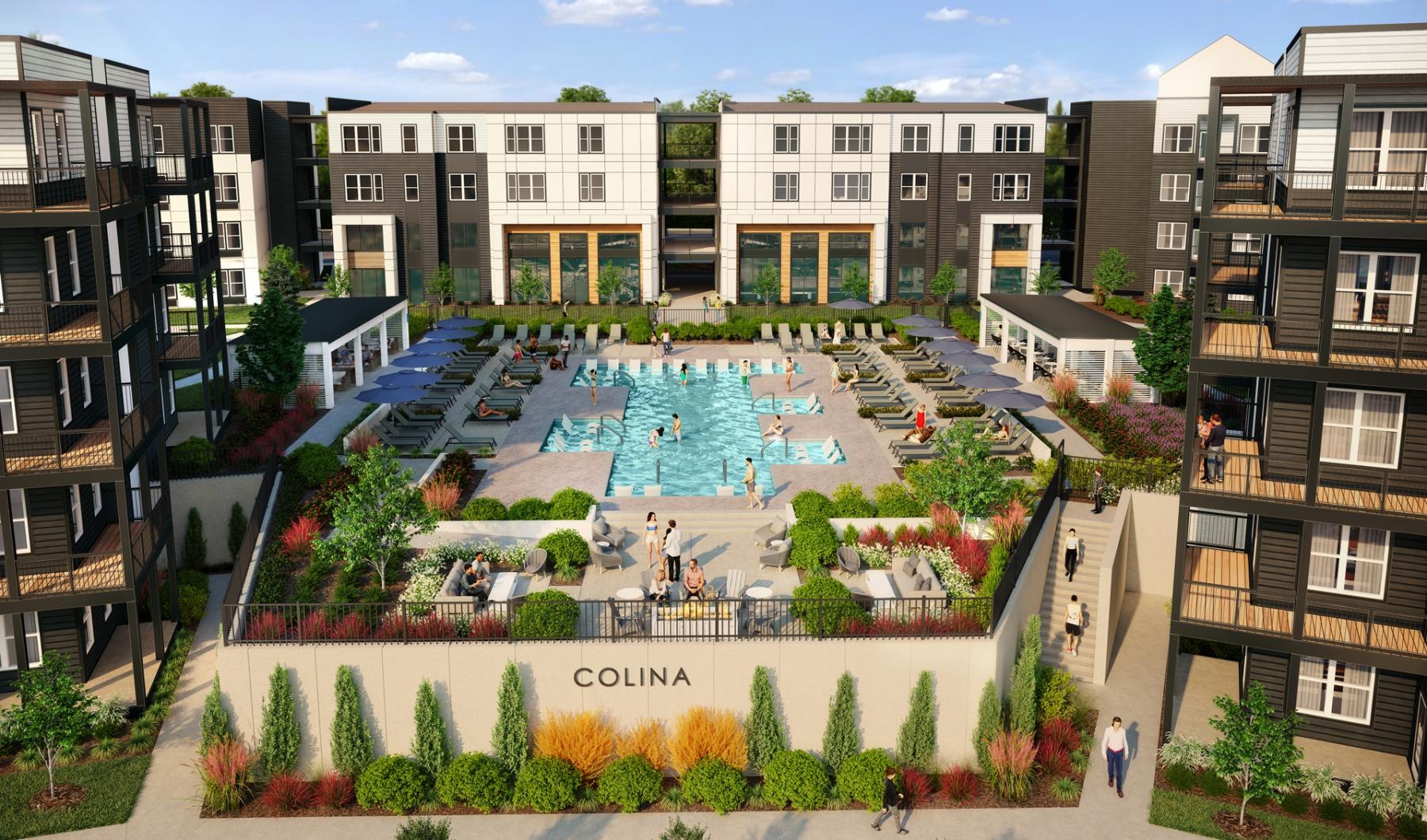 a courtyard with a pool and buildings around it